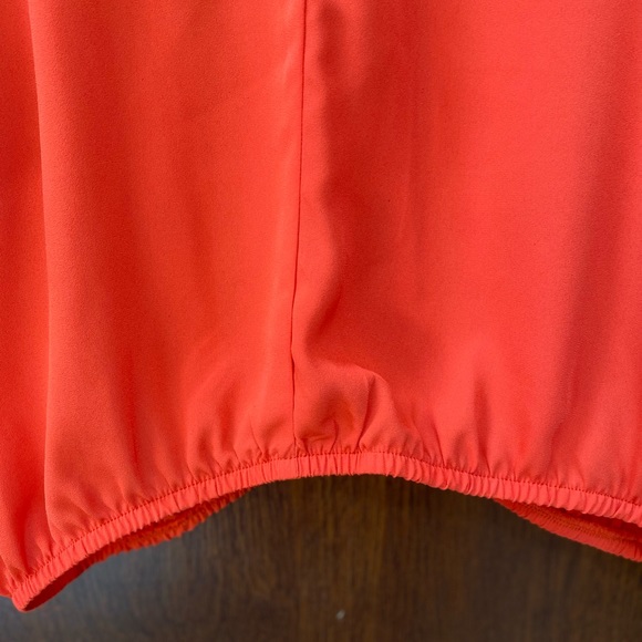 XOXO red/orange blouson top with criss-cross detail on back. - Picture 6 of 7